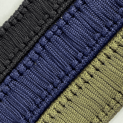 Three rope braids in black, blue, and green, designed for use as an decorative element with a steel tongue drum.