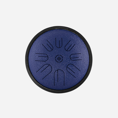 Front view of Novadrum 28 steel tongue drum in blue textured finish, with precision-cut tongues arranged symmetrically around a central logo.