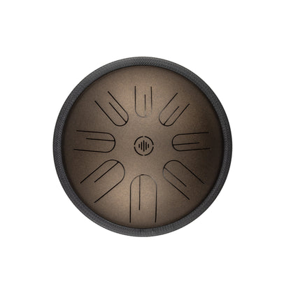 Front view of Novadrum 28 steel tongue drum in bronze matte, featuring precision-cut tongues symmetrically arranged around a central logo