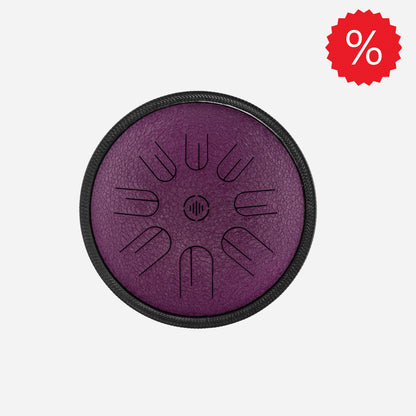 Front view of Novadrum 28 steel tongue drum in purple textured finish, with precision-cut tongues arranged symmetrically around a central logo. With SALE icon