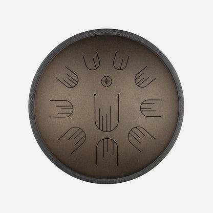 Front view of Novadrum 38 steel tongue drum in bronze matte, with precision-cut tongues arranged symmetrically around a central logo.