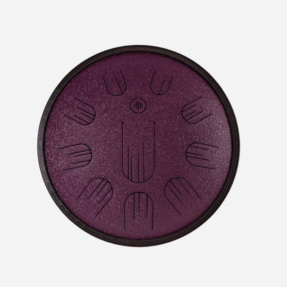 Front view of Novadrum 38 steel tongue drum in black textured finish, with precision-cut tongues arranged symmetrically around a central logo.